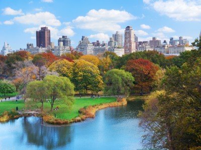 New York City Manhattan Central Park panorama in Autumn lake with skyscrapers and colorful trees with reflection_800x600
